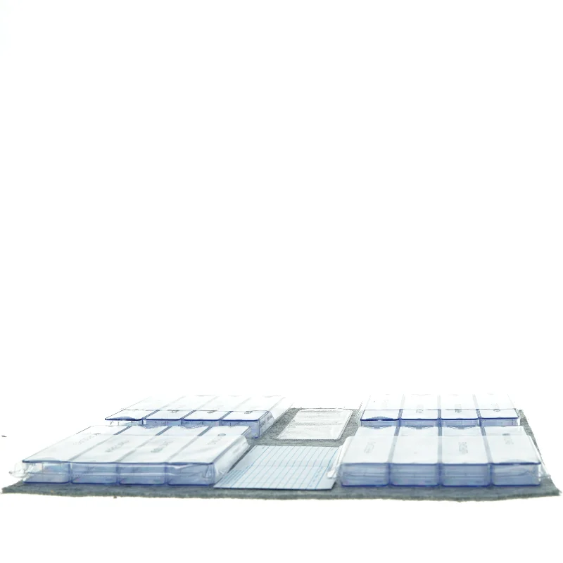 Pille i etuier med forskellige ugedage (str. 15 cm)