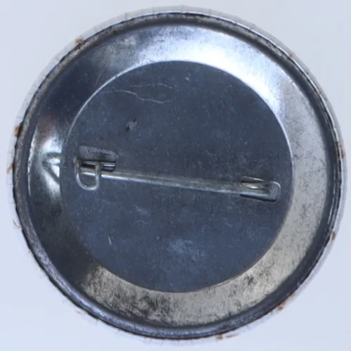 Rund badge med tekst (str. Ø 5,5 cm)