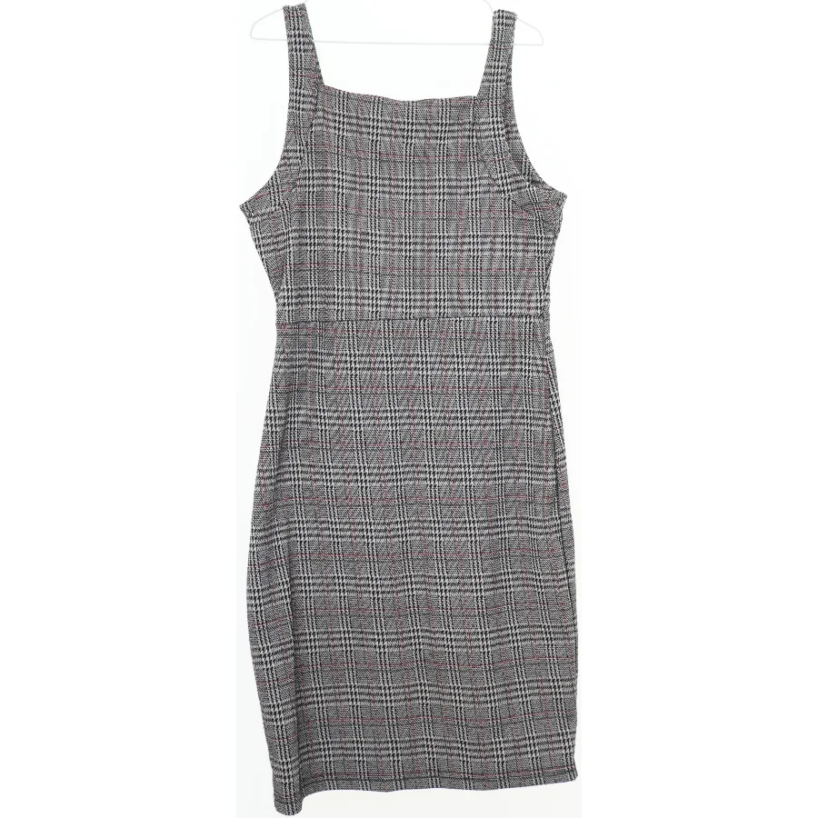 Pinafore kjole med skotsk tern fra Nxt (str. 164)