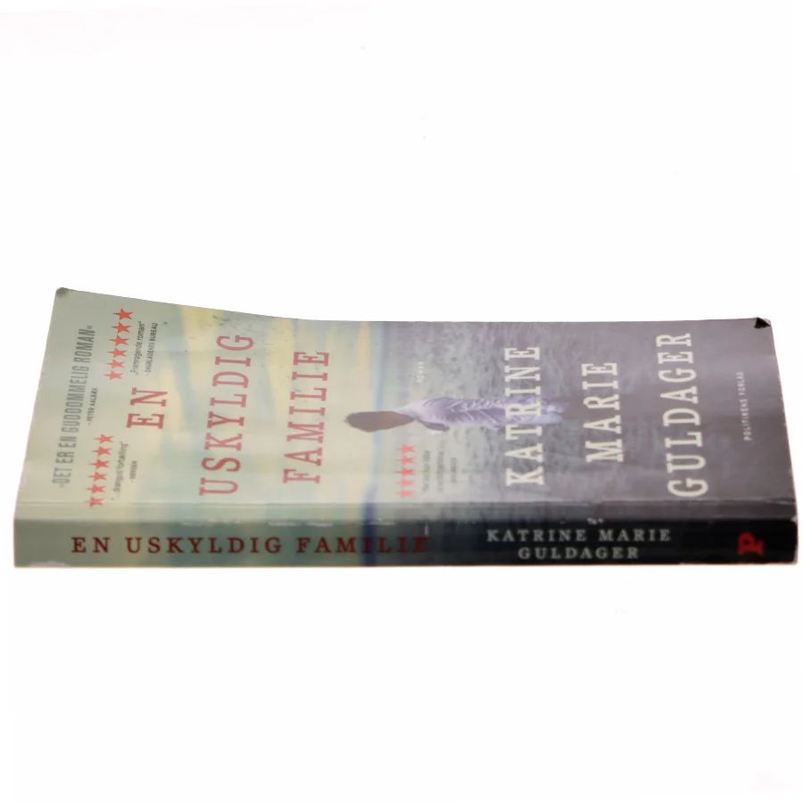 En uskyldig familie af Katrine Marie Guldager fra Politikens Forlag