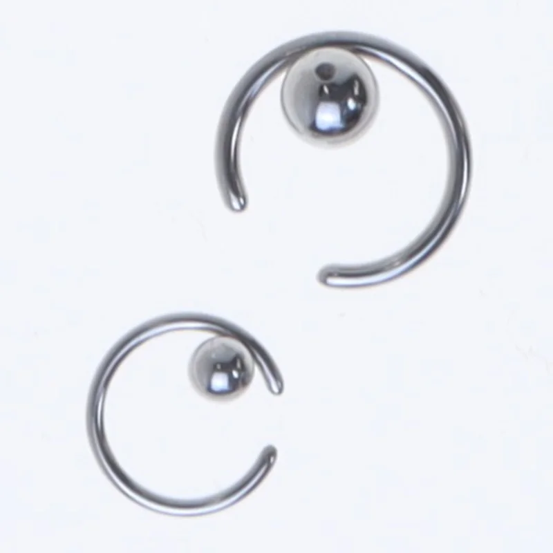 Piercingsmykker (str. Ø en cm og o en komma 2 cm)