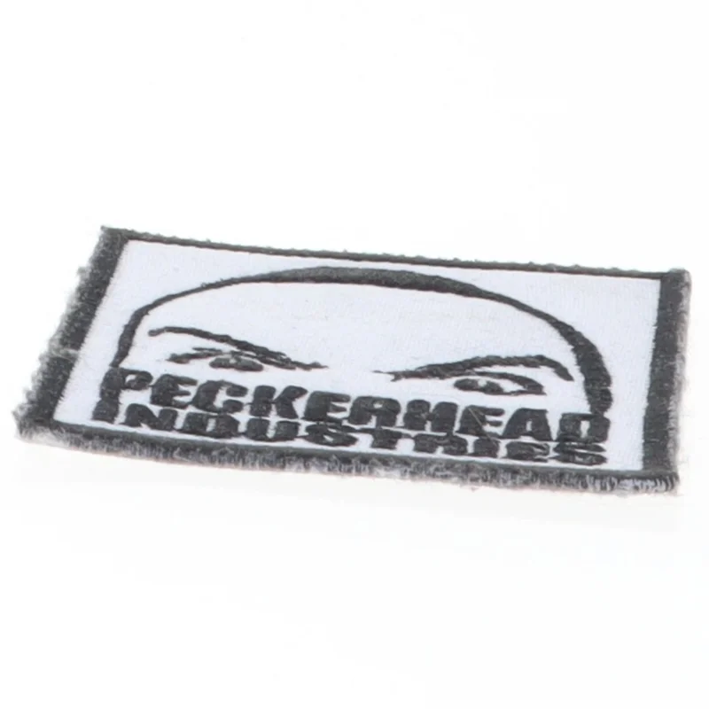 Stofmærke med logo (str. 6 x 6 cm)