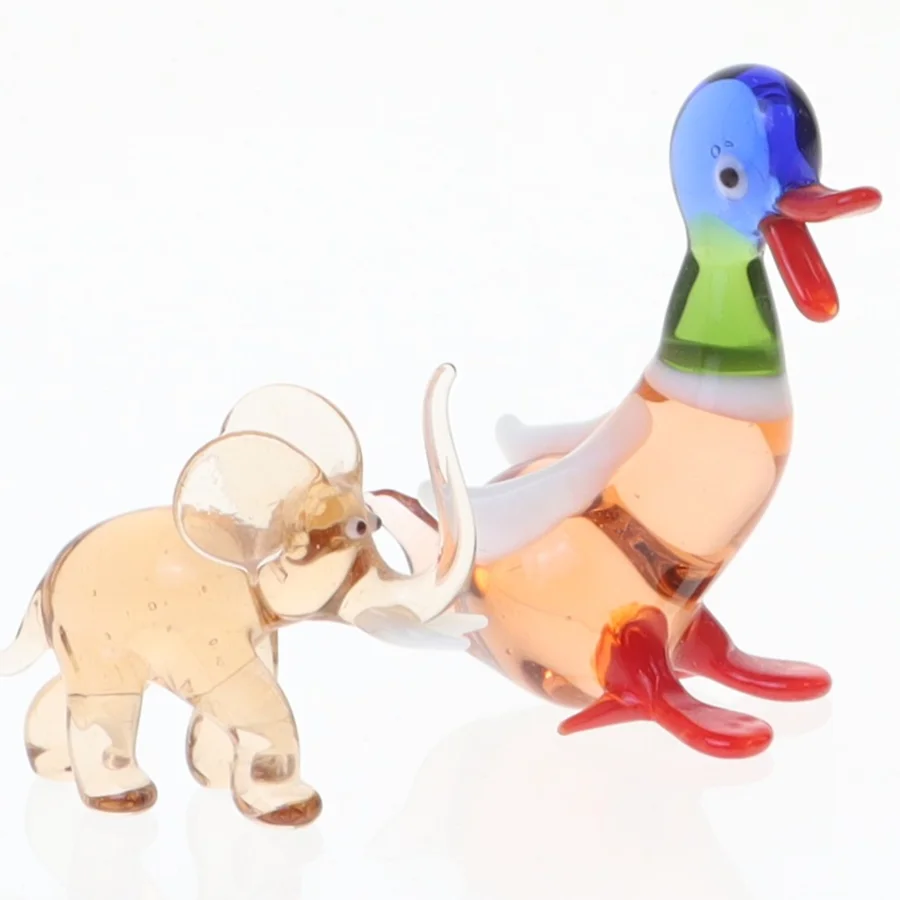 Glasfigurer af and og elefant