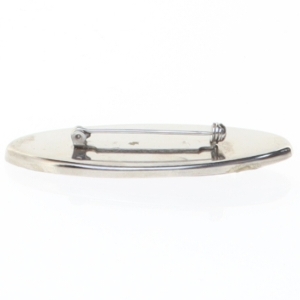 Broche i sølvfarve med lilla emalje og sten (str. 6 x 2,6 cm)