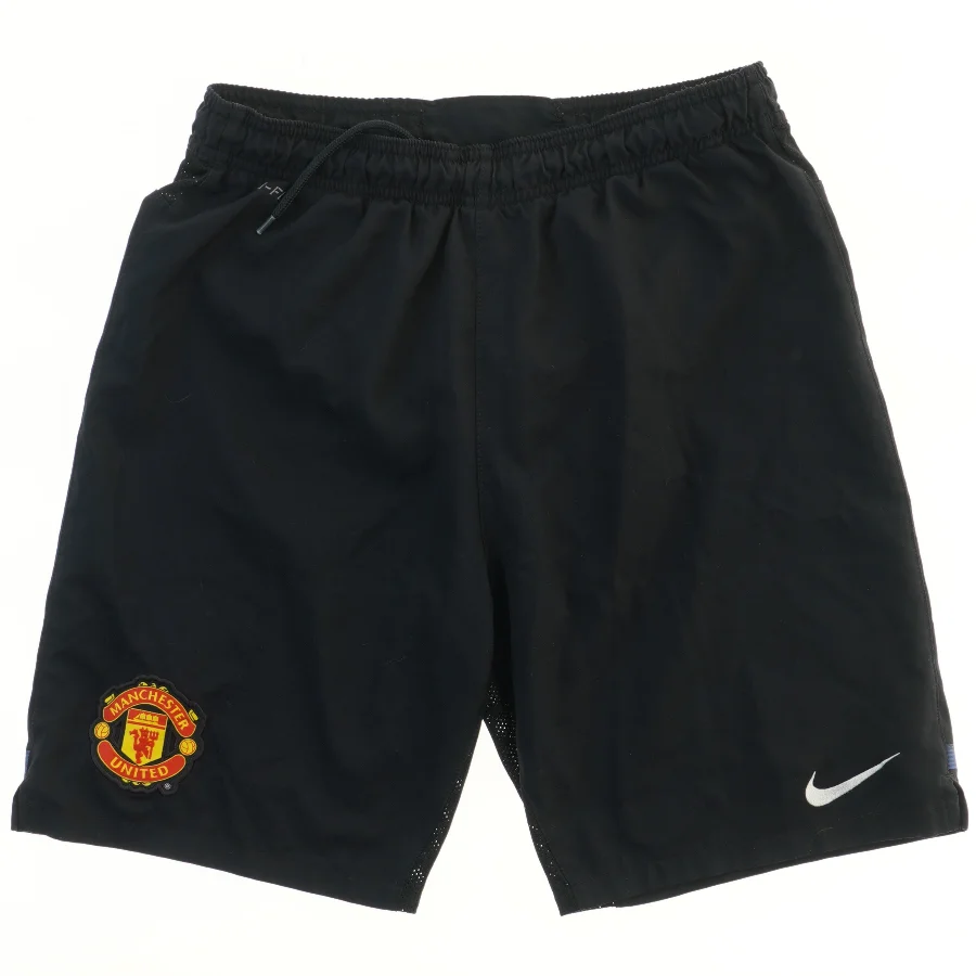 Manchester United shorts fra Nike (str. 152)