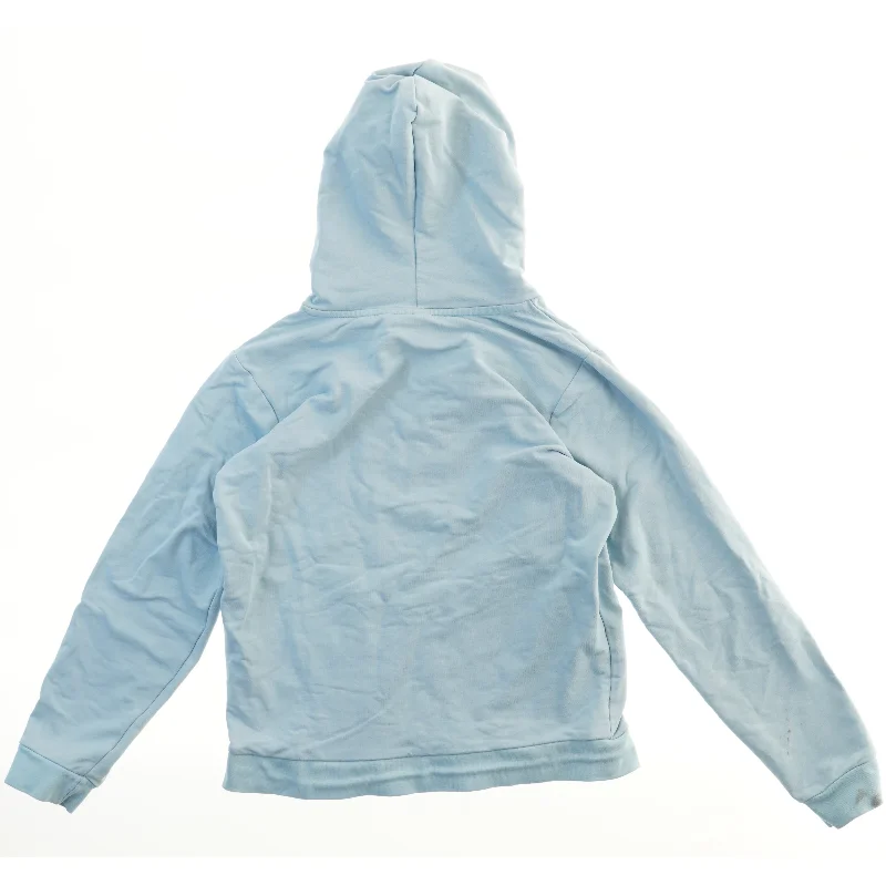 Lyseblå hættetrøje fra Hummel (str. 152)