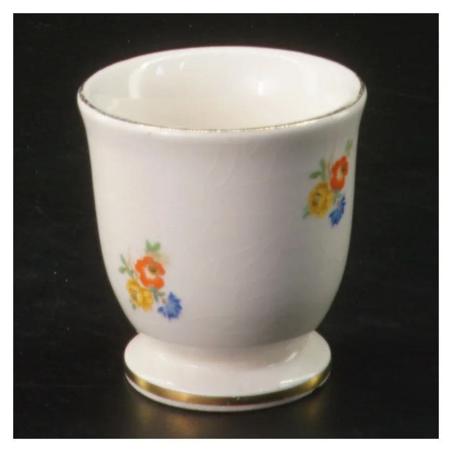 Lille porcelænskop med blomstermotiv (str. Ø 5 cm længde 5,5 cm)