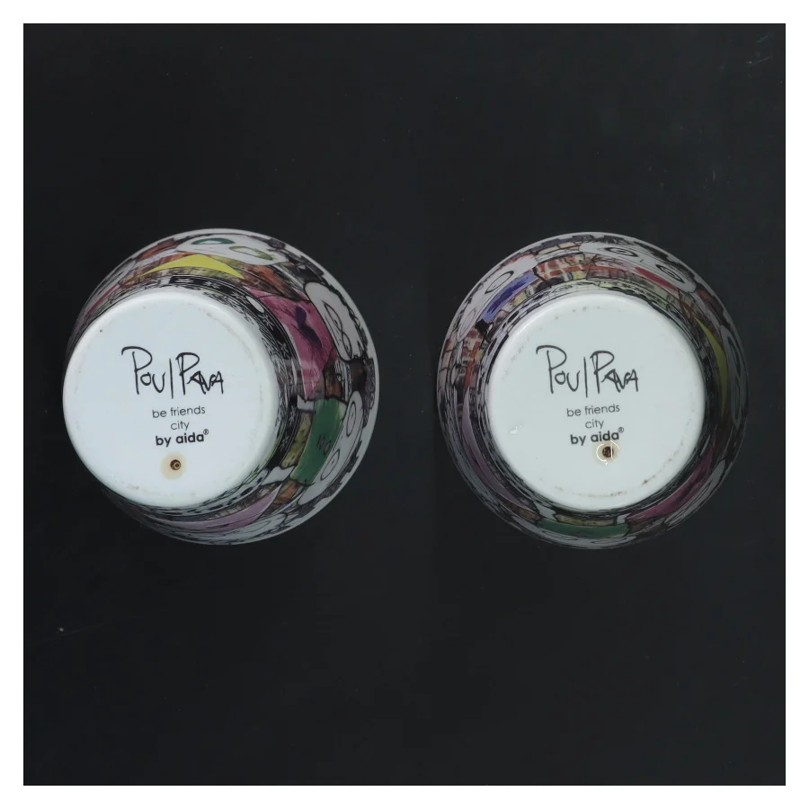 2 stk illustrerede krus fra Poul Pava (str. 2 stk Ø 9 cm længde 12,5 cm)