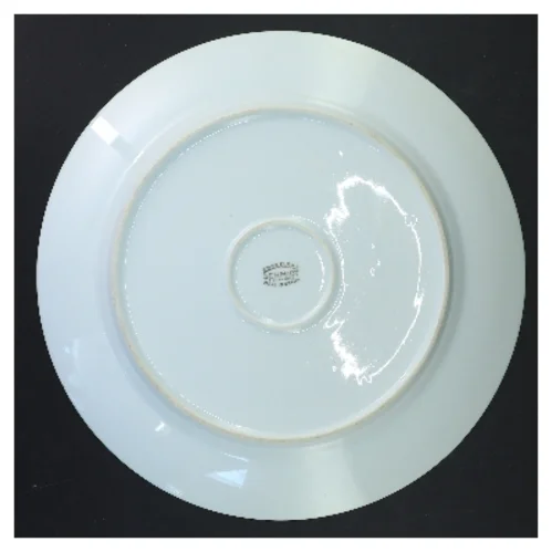 Porcelænstallerken med orange blomsterkant fra Schmidt (str. Ø 28 cm)