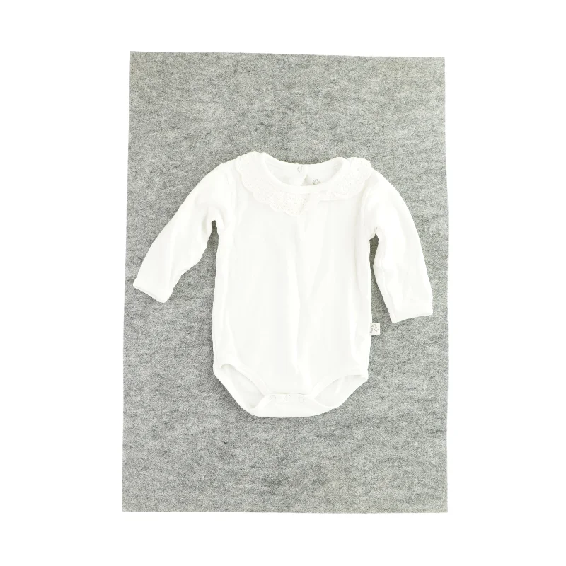 Langærmet bodystocking med krave (Str. 62)