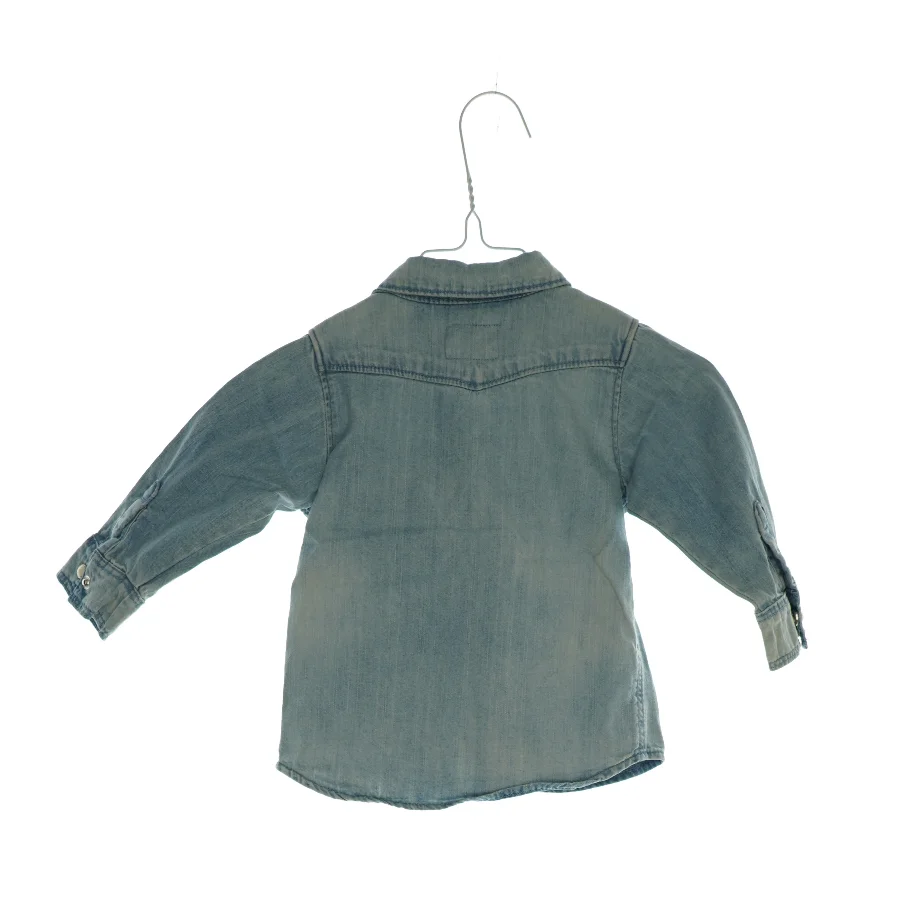 Bluse fra H&M (str. 68)