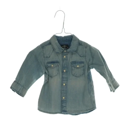 Bluse fra H&M (str. 68)