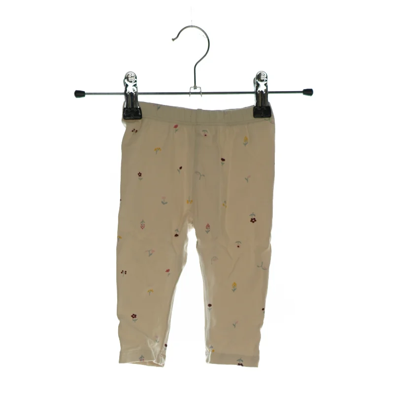 Bukser med forskellige blomster på (str. ca. 62)