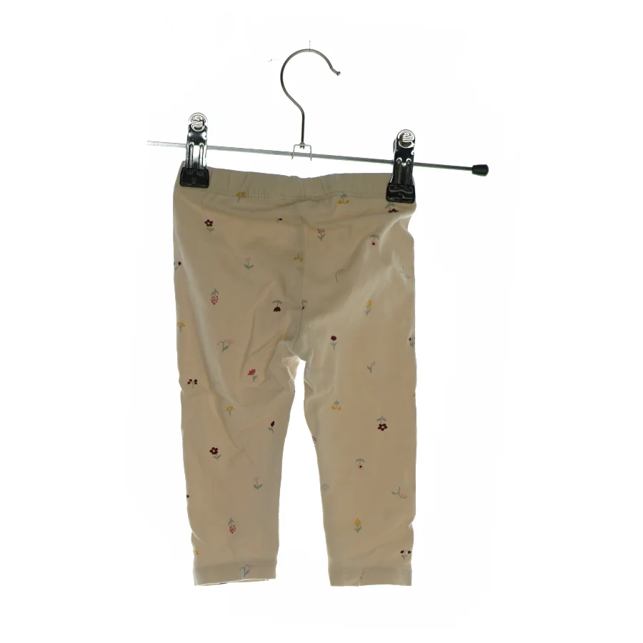 Bukser med forskellige blomster på (str. ca. 62)