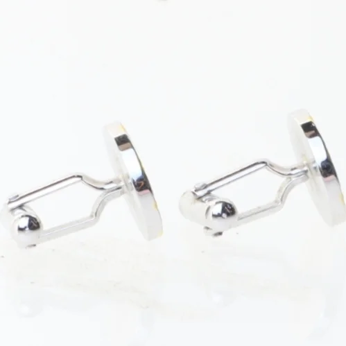 Manchetknapper med uremotiv (str. 1,5x1,7 cm)