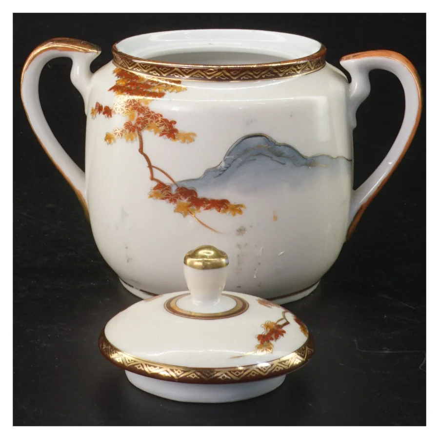 Porcelænstepotte med låg og dekoration (str. Ø 10 cm)
