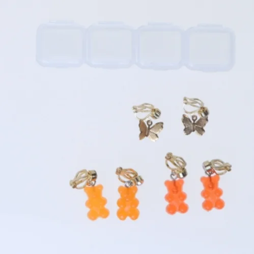 Guld og orange klips øreringe (str. 10x2 cm)