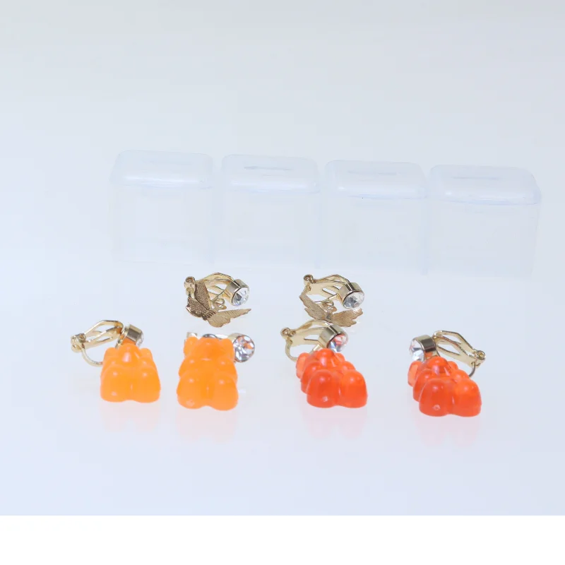 Guld og orange klips øreringe (str. 10x2 cm)