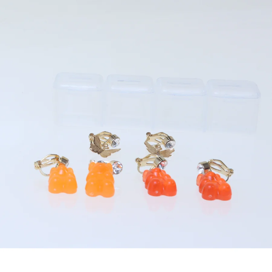 Guld og orange klips øreringe (str. 10x2 cm)