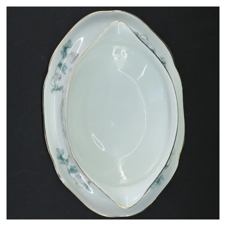 Porcelæns saucesæt med blomstermotiv (str. 21,5 cm)