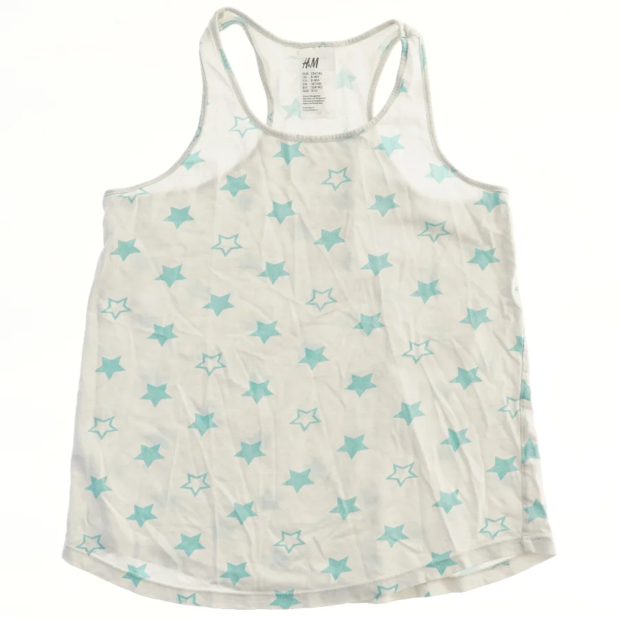 Hvid tanktop med stjernemønster fra H&M (str. 134)