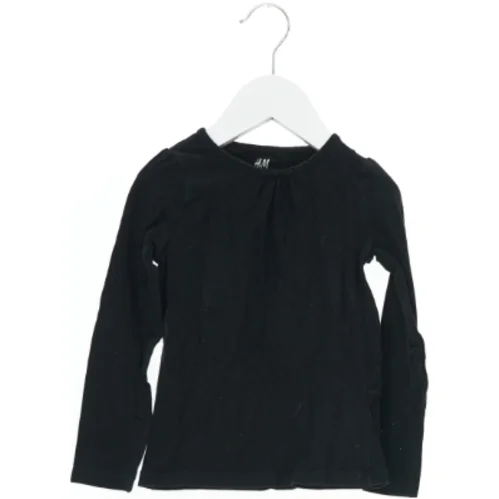 Langærmet sort bluse fra H&M (str. 98)