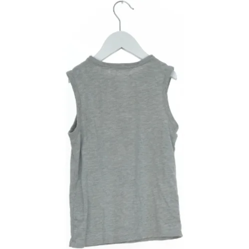 Grå tanktop med Rolling Stones print fra H&M (str. 128)