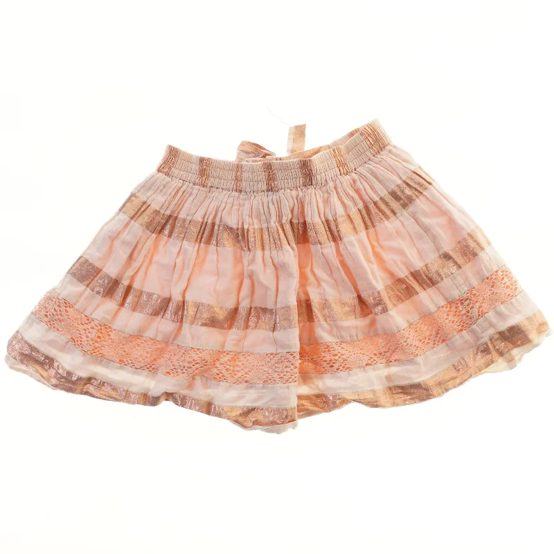 Piget nederdel med bånd (str. 128)