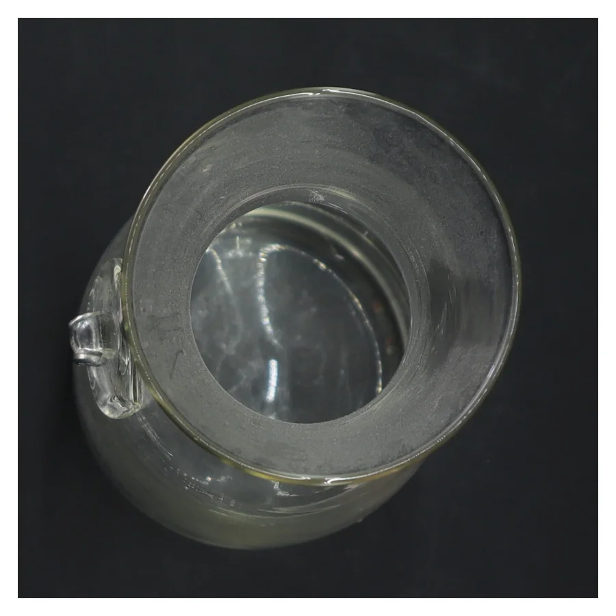 Glaskaraffel med emblem (str. Ø 7,5 cm længde 27,5 cm)