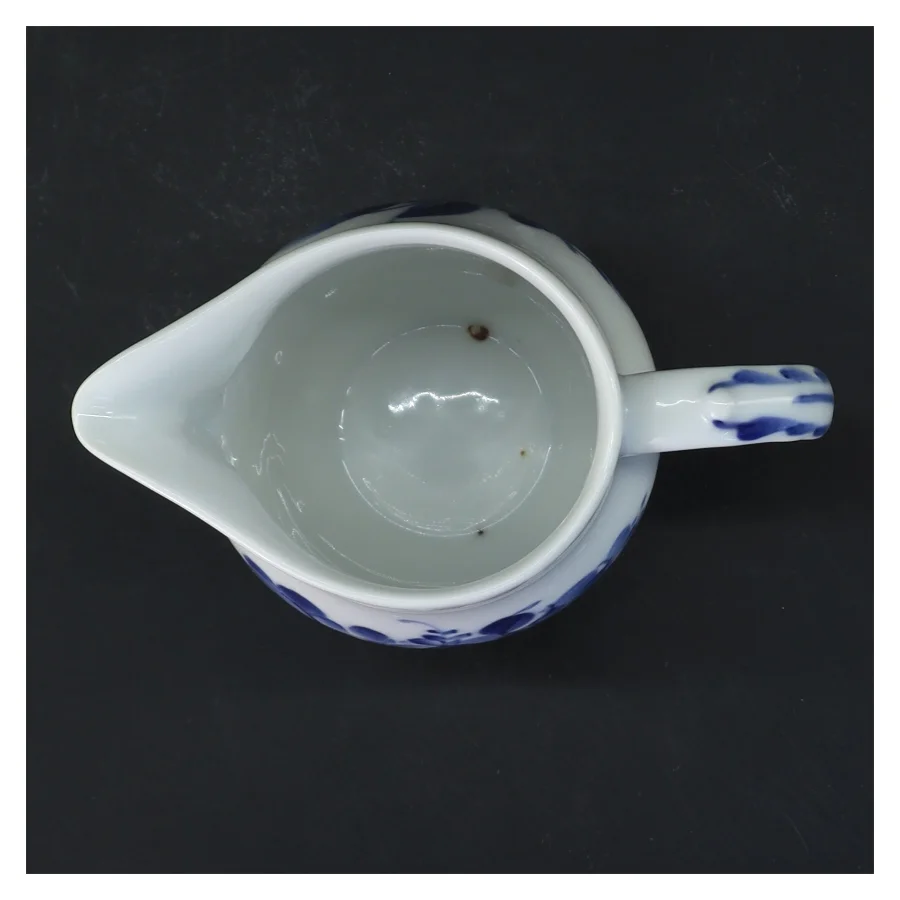 Kande med blomsterprint fra Royal Copenhagen, med blå blomst motiv (str. 13 cm)