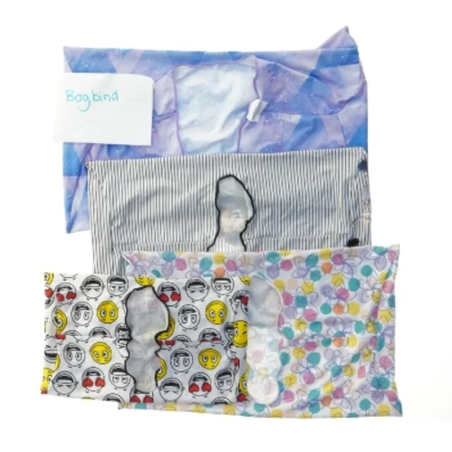 Sæt med bogbind i forskellige designs (str. 39x24 og 27x16 cm)