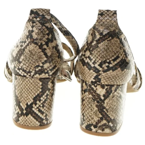 Sko med slangeskindsdesign, str. 38 fra Depeche (str. 38 )