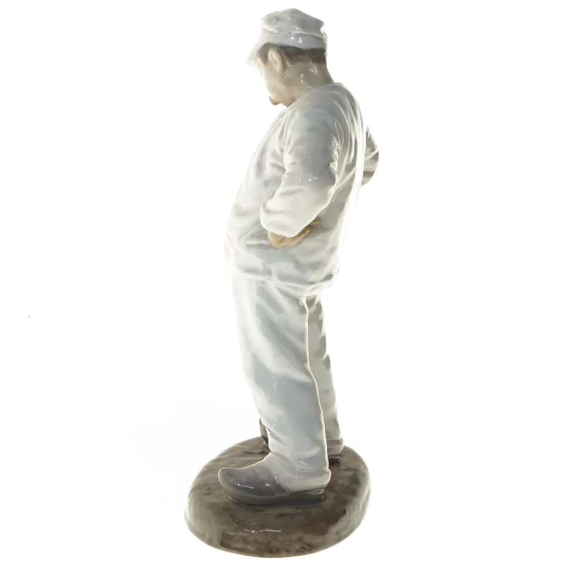 Porcelænsfigur af stående person fra B&G (str. 28,5 cm)