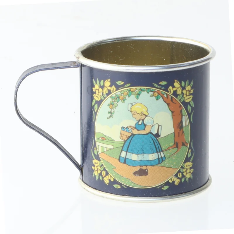 Irma retro .Lille dekorativ blikkrus (str. Ø 4 cm længde 4 cm)