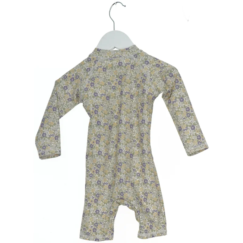 Blomstret heldragt til børn fra Hust & Claire (str. 74)