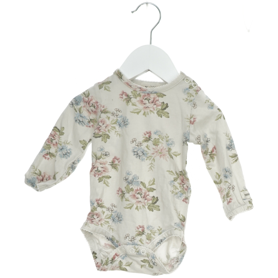 Blomsterprint bodystocking fra Newbie (str. 62)