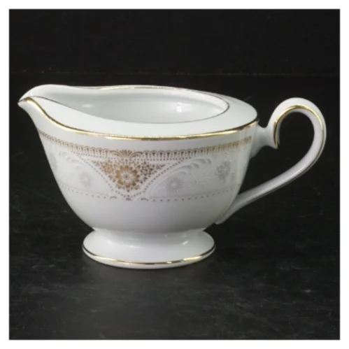 Porcelænskande med guldkant fra Noritake (str. Ø. 10 cm. h. 6 cm)