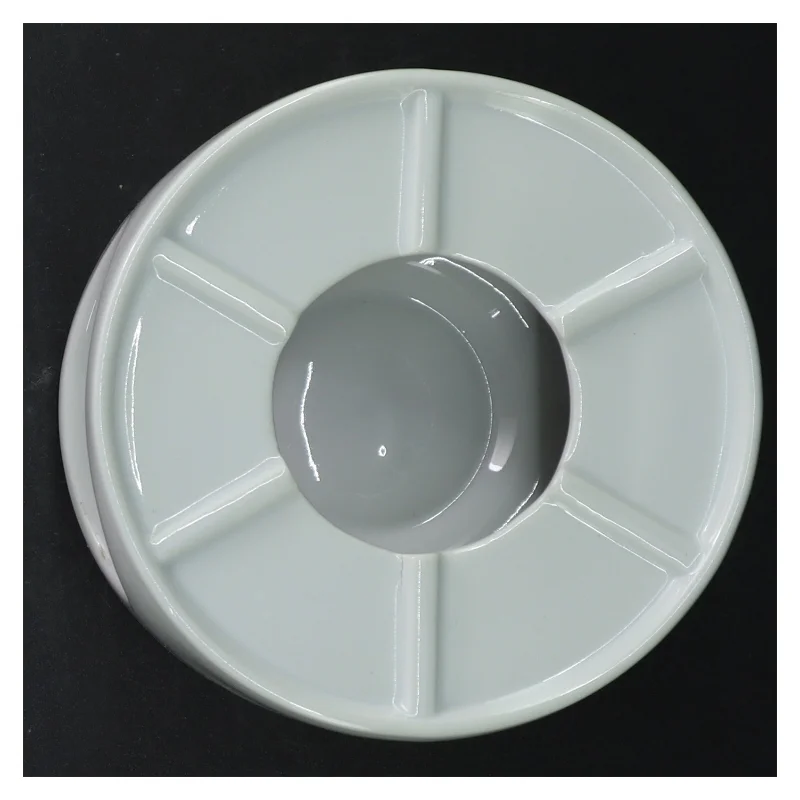 Fyrfad i porcelæn (str. H 7 cm. ø. 13,5 cm)