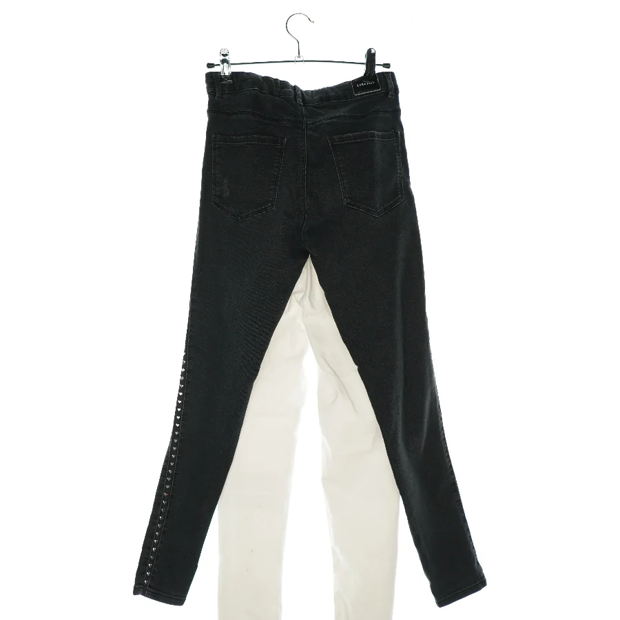 Bukser med huller (2 stk) (str. 140/152)