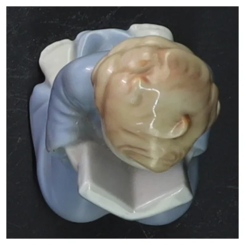 Metzler & Orloff porcelænsfigur læsende barn (str. 9 cm)