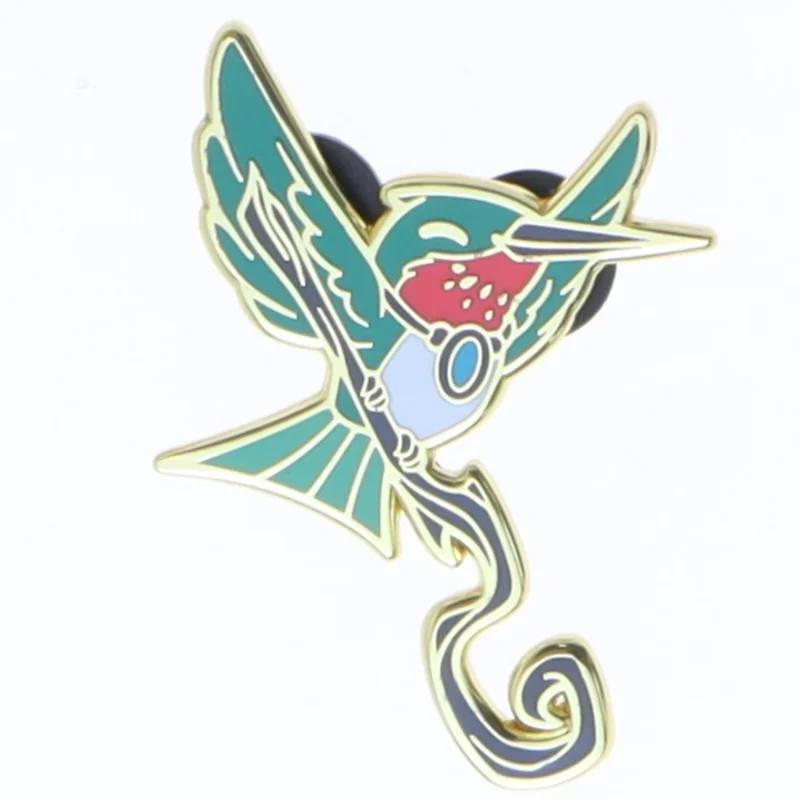 Broche med kolibri motiv (str. 4x3 cm)