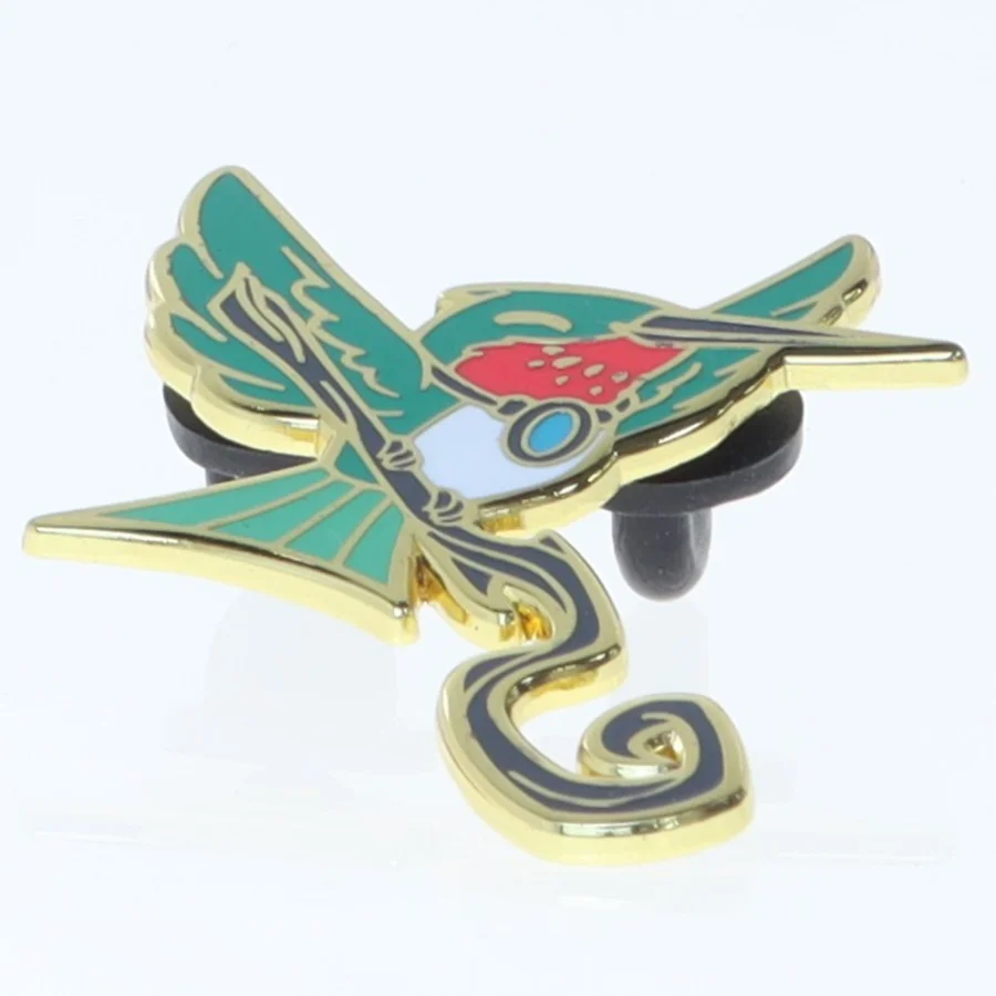 Broche med kolibri motiv (str. 4x3 cm)