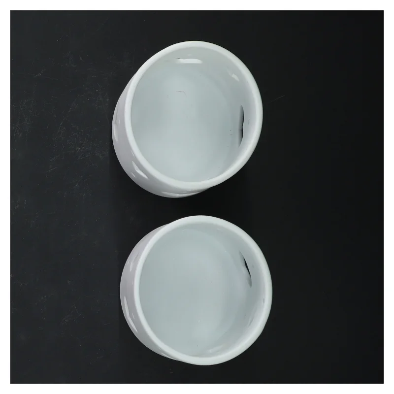 Hvide fyrfadslysestager fra Scandinavia Gifts (str. 8 cm)