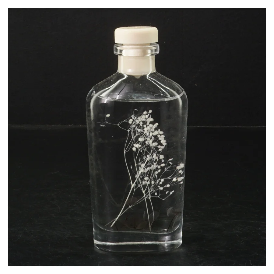 Duftepinde og glasflaske med dekorative blomster (str. H. 15,5 cm)