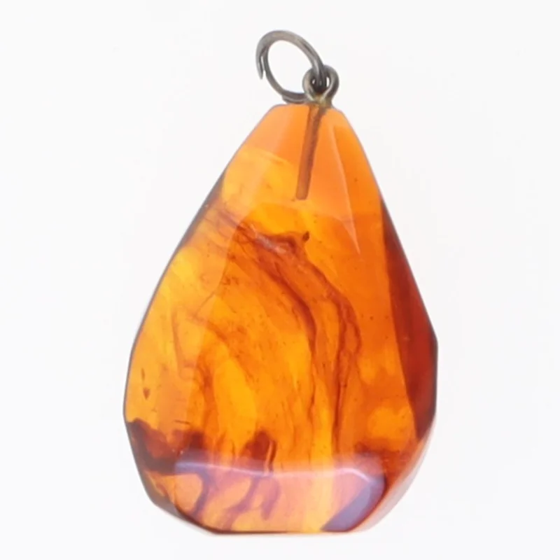 Ravfarvet vedhæng (str. 4 x 2 cm)