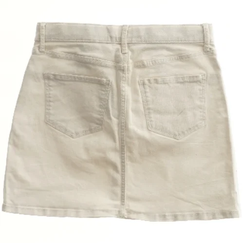 Kort nederdel i denim fra H&M (str. 152)