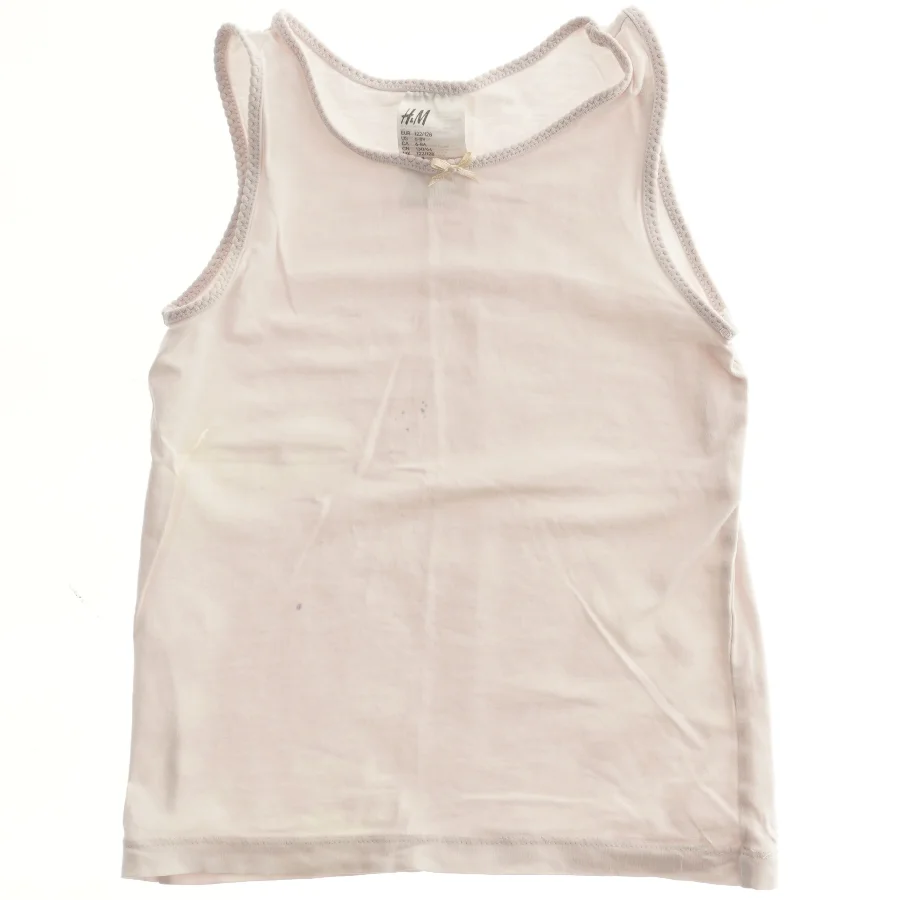 Lyserød tanktop fra H&M (str. 128)