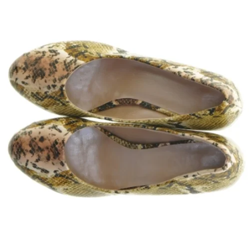 Slangeprint pumps (str. 38)