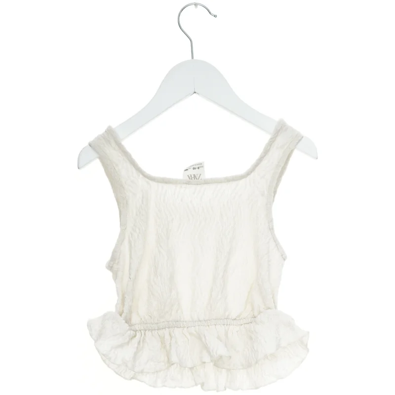 Hvid top med flæser fra Zara (str. 140)
