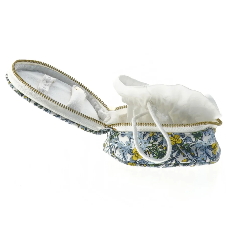 Blomstret smykkepose fra Søstrene Grene (str. Ø 11 cm)